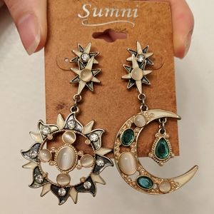Celestial sun and moon asymmetrical earrings